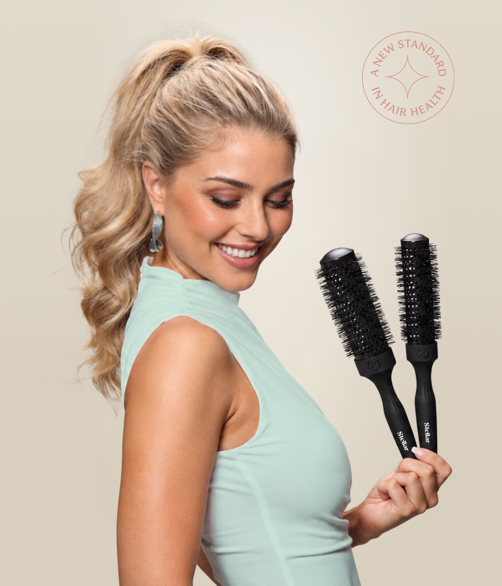 Woman with long dark waves against a fashion editorial background